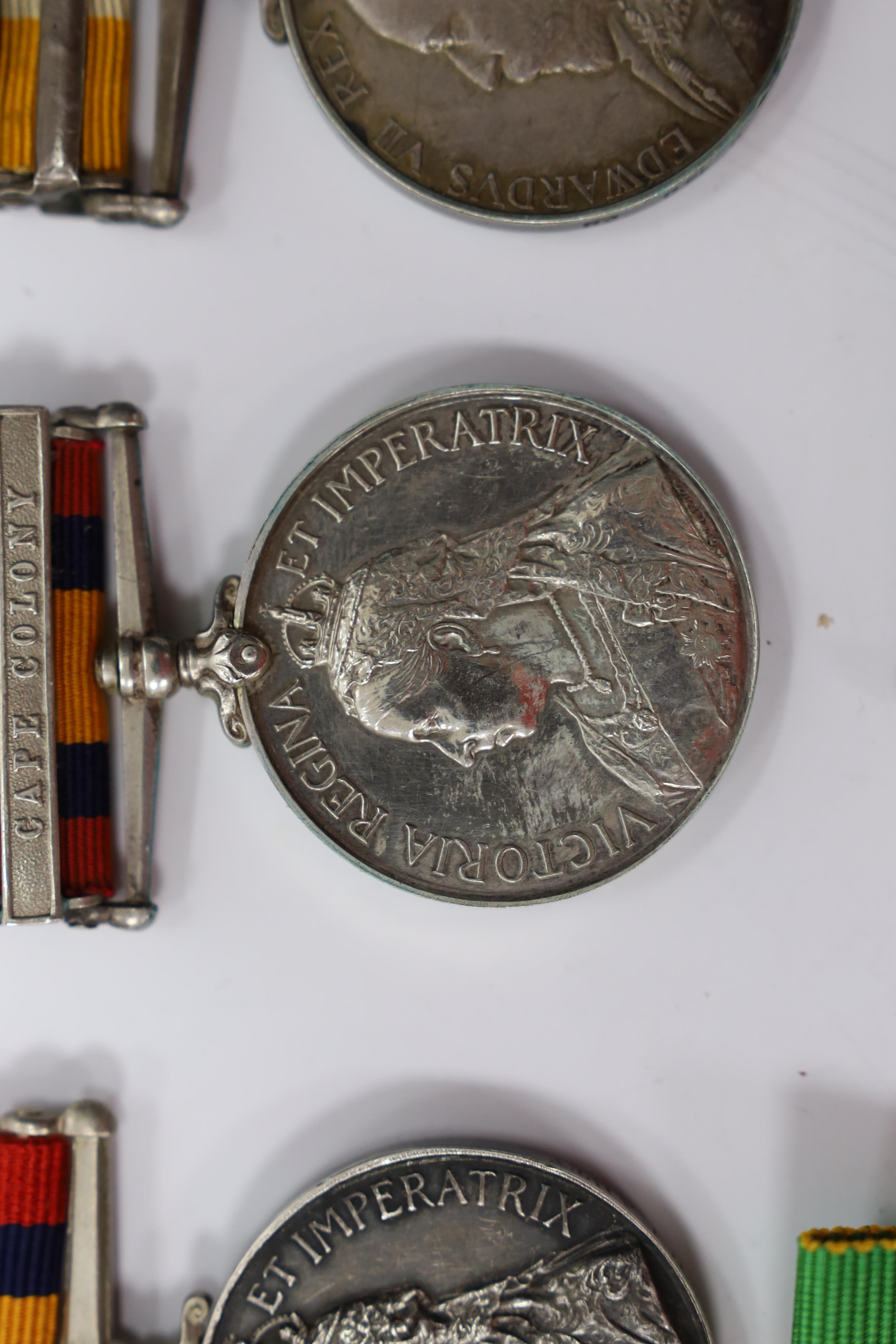 Assorted medals; two replica British North Borneo medals; Balaklava medallion; bronze GV medal; German China Campaign medal; bronze NRA medallion, unnamed